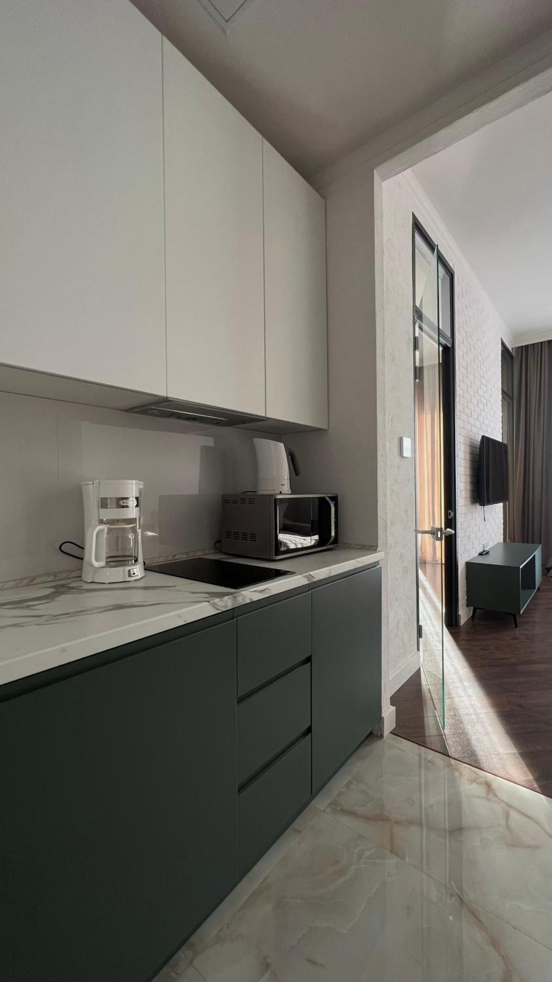 Hotel Manica Esentai City Alma-Ata Buitenkant foto